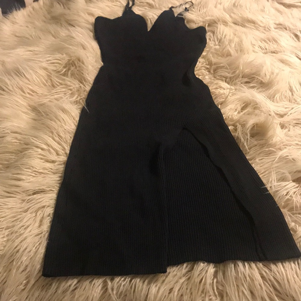 Spaghetti strap black dress with high slit